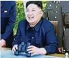  ??  ?? Machthaber Kim Jong-un beobachtet mit Militärs den Raketentes­t. Foto: dpa