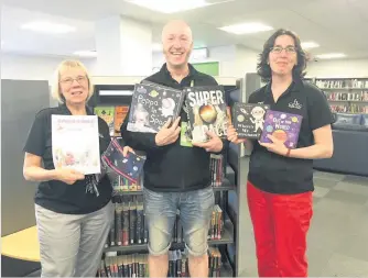  ??  ?? Halton Council library staff Joy Guest, Richard Blay and Emma Boothe