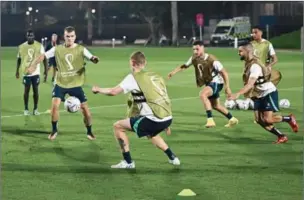  ?? (AFP) ?? Australia’s teammates take part in a training session at the Aspire Zone Training site in Doha on Monday, on the eve of their FIFA World Cup Qatar 2022 match against France.