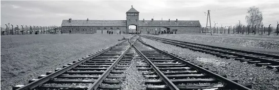  ?? MARKUS SCHREIBER/AP PHOTOS ?? Railway tracks lead to Auschwitz II, or Birkenau, where hundreds of thousands of prisoners were directed to Nazi gas chambers. The death camp was liberated Jan. 27, 1945.