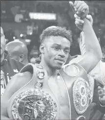  ??  ?? Errol Spence Jr., now has two of the four World title belts in the welterweig­ht division following his decision win over Shawn Porter Saturday night.