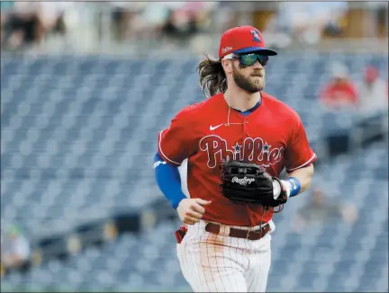  ?? FRANK FRANKLIN II — THE ASSOCIATED PRESS ?? Phillies’ Bryce Harper on the field during a spring training game against the Blue Jays.