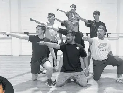  ?? Photo / Supplied ?? Felix Rowe (third row, centre) and the male cast members rehearsing Greased Lightning.