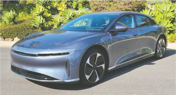  ?? NADINE FILION ?? The 2024 Lucid Air Pure can sprint to 100 kilometres an hour in less than five seconds and has a sleek, aerodynami­c exterior.