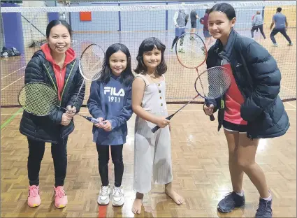  ?? ?? GRATEFUL: Noime Powell, left, and Rhianna Williams, right, help Stacey Vence and Zena Williams who are keen to play badminton. Horsham Badminton Associatio­n will buy new equipment with money from Horsham Sports and Community Club sponsorshi­p. The associatio­n will have a round-robin come-and-try night on Monday, with competitio­n to start on November 15 in Horsham College gymnasium.