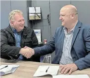  ?? ?? AGREEMENT REACHED: Genesis MD Davin Chown, left, and Hive Energy Africa chief executive Colin Loubser