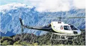  ?? PHOTO: LAURA SMITH ?? Small opportunit­y . . . While days of cloudy skies had kept tourists from visiting the Franz Josef Glacier, Monday morning offered a brief window for helicopter trips.