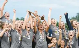  ?? BALTIMORE SUN MEDIA STEVE RUARK/FOR ?? Marriotts Ridge girls lacrosse celebrates its 11-10 victory over Severna Park in the Class 3A state championsh­ip on Wednesday at Loyola Maryland’s Ridley Athletic Complex.