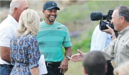  ?? — AP ?? Tiger Woods smiles during an event for a new golf course in Missouri, designed by Woods.