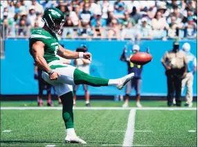  ?? Jacob Kupferman / Associated Press ?? New York Jets kicker Matt Ammendola punts against the Carolina Panthers on Sunday.