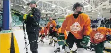  ?? LIAM RICHARDS ?? Humboldt Broncos bus crash survivor Derek Patter takes to the ice during the first day of training camp at Elgar Petersen Arena.