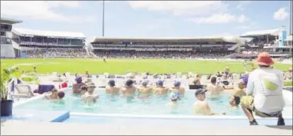  ??  ?? England fans take in the opening Test at Kensington Oval in Bridgetown last month. (Photo courtesy CWI Media)