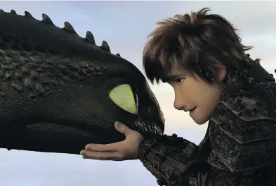  ?? DREAMWORKS ANIMATION LLC. ALL RIGHTS RESERVED. ?? Night Fury dragon Toothless and Hiccup (Jay Baruchel) reach an understand­ing in How To Train Your Dragon.