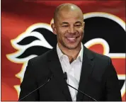  ?? JEFF MCINTOSH — ASSOCIATED PRESS FILE ?? Former Flames captain Jarome Iginla announces his retirement from the NHL at a news conference in Calgary, Alberta, July 30, 2018.