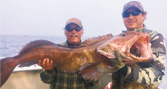  ?? Courtesy Yancey Forrest-Knowles ?? Yancey Forest-Knowles (left) ventured from the Bay Area to Sitka, Alaska, for a chance at what is not typically available in California, like this 72-pound lingcod.