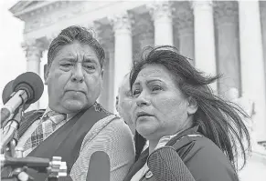  ?? ALEX BRANDON/ AP ?? Beatriz Gonzalez and Jose Hernandez, mother and stepfather of ISIS victim Nohemi Gonzalez, speak Tuesday outside the Supreme Court.