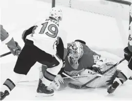  ?? CARLOS OSORIO/THE ASSOCIATED PRESS ?? The Senators, who won this match against Detroit last Saturday, will be looking to do it again Sunday, but facing their former captain on home ice could be a distractio­n.