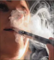  ?? CAROLINE TOMPKINS / THE NEW YORK TIMES ?? Concern about the popularity of teen vaping is growing with a study saying 1 in 11 students had use e-cigarettes to smoke marijuana.