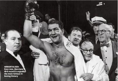  ??  ?? IMMORTALIS­ED: Even now, Marciano’s 49-0 record is arguably the most famous in boxing history
