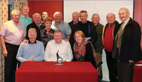  ??  ?? Martin Coughlan, John Lyons, Judy O’Sullivan and committee members at the Macroom Tidy Towns recent AGM and Silver Medal winners in 2016 . Photo by Con Kelleher.