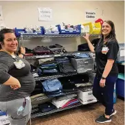  ?? CONTRIBUTE­D PHOTO ?? Christine Sullivan, Miami Valley Hospital emergency trauma center technician, and Erica Rosner, RN, clinical nurse educator, inside Cindy’s Closet, a resource for emergency room patients at the hospital who need replacemen­t clothing.