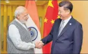  ?? PTI ?? Prime Minister Narendra Modi shakes hands with Chinese President Xi Jinping at a meeting in Tashkent in 2016.