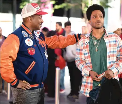  ?? AMAZON STUDIOS PHOTOS ?? ABOVE: Prince Akeem (Eddie Murphy) learns he has a son, Lavelle (Jermaine Fowler), in New York in “Coming 2 America.” LEFT: Arsenio Hall returns as the royal aide Semmi alongside Tracy Morgan as Lavelle’s Uncle Reem.