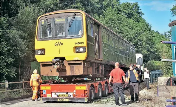  ?? ?? One half of ‘Pacer’ No. 143619 – DMS No. 55600 – arrives at the Tanat Valley Railway on August 5. Graham Hickman