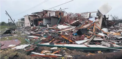  ?? Picture: AFP ?? AFTERMATH. A wrecked two-storey apartment building after Hurricane Harvey hit.