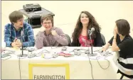  ?? LYNN KUTTER ENTERPRISE-LEADER ?? Members of Farmington High School’s Academic Competitio­n in Education team, Brandon Conrad, left, Jeffrey Kutter and Chloe Lochridge, right, react to their teammate, Monica Witt. Monica correctly answered her question and had just pumped her arm in the air with excitement. It was her first correct answer for the season. Farmington won its match last week and will advance to the championsh­ip round Feb. 16.