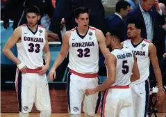  ??  ?? MARK J. REBILAS, USA TODAY SPORTS Killian Tillie (33) and Nigel Williams- Goss will be back for Gonzaga. if Zach Collins (32) returns, he’s a sure starter.