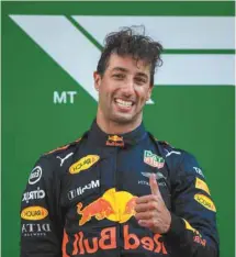  ?? JOHANNES EISELE AGENCE FRANCE-PRESSE ?? Daniel Ricciardo de Red Bull s’est imposé devant Valterri Bottas de Mercedes et Kimi Raikkonen de Ferrari.