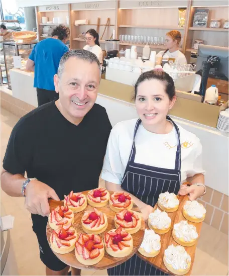 ?? ?? Gambaro Group owner John Gambaro, with pastry chef Perla Santana, at new Awaken Cafe at Duranbah. Picture: Glenn Hampson