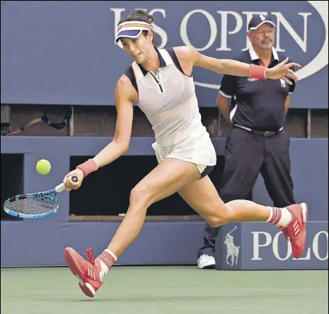  ?? AFP PHOTO ?? Garbine Muguruza of Spain makes a return against Varvara Lepchenko of the US in a firstround match in New York on Monday.