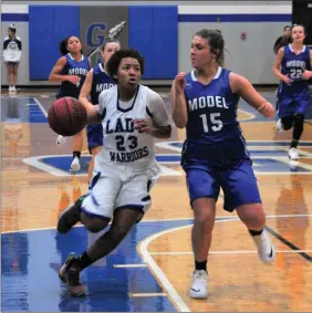  ?? / Frank Crowe ?? Gordon Central’s Mercedes Coleman drives to the rim against Model in a home game earlier this season. Coleman was a key factor in the team’s win over Pepperell last Friday.