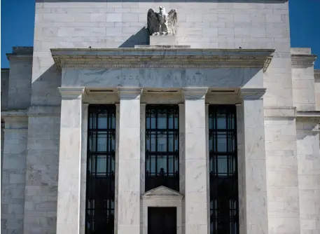  ?? GETTY IMAGES FILE ?? KEY SUPPORT: The Federal Reserve will buy small business loans issued by banks as part of a $349 billion lending program, giving banks an incentive to issue the loans. The move follows a call for Treasury Secretary Steven Mnuchin to work with the Fed to shore up the program.