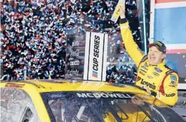  ?? JARED C. TILTON/GETTY ?? Michael McDowell celebrates in victory lane after winning the NASCAR Cup Series Daytona 500 on Feb. 14 at Daytona Internatio­nal Speedway.
