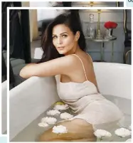  ??  ?? IZA Calzado