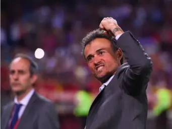  ??  ?? Luis Enrique celebrates after securing one final trophy at Barca (Getty)