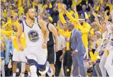  ?? JEFF CHIU/ASSOCIATED PRESS ?? Golden State’s Stephen Curry (30) reacts after scoring against San Antonio in the second half of Sunday’s game.