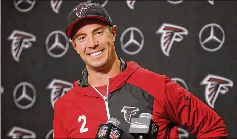  ?? CURTIS COMPTON / CCOMPTON@AJC.COM ?? Falcons quarterbac­k Matt Ryan is all smiles speaking during a news conference after signing a new five-year, $150 million contract extension last week. At the end of this extension, Ryan will have earned $327.4 million in the NFL, according to NFLPA...