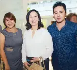  ??  ?? Kathy and Jan Arceo with Robbie Pinera.