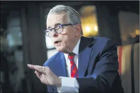  ?? JOHN MINCHILLO — THE ASSOCIATED PRESS FILE ?? Ohio Gov. Mike DeWine speaks Dec. 13 about his plans for the coming year during an interview at the Governor’s Residence in Columbus.