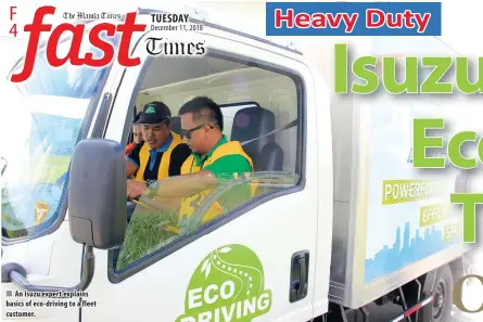  ??  ?? An Isuzu expert explains basics of eco- driving to a fleet customer.