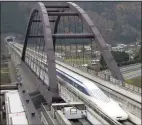  ?? Chiaki Tsukumo / Associated Press ?? Reaching 310 miles per hour takes less than a minute and a half for Japan’s maglev train, which derives its name from the way it uses an electromag­netic cushion instead of wheels for levitation and propulsion.