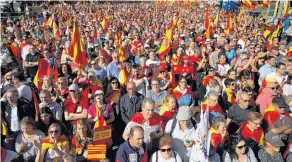  ?? Picture / AP ?? Supporters of a unified Spain filled the streets of Barcelona yesterday.