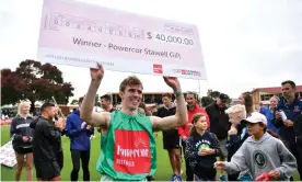  ?? Photograph: Joel Carrett/AAP ?? Harrison Kerr, pictured, and Carla Bull each pocketed Stawell Gift winner’s cheques of $40,000 in the men’s and women’s events.