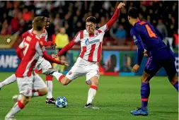  ??  ?? Milan Pavkov scores his second goal in Red Star Belgrade’s 2-0 win over Liverpool in their Champions League match in Belgrade yesterday.