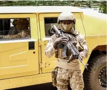  ?? GETTY IMAGES ?? Special forces on guard in Mali following a coup in the West African nation in August 2020. A new study says Africa is less democratic and safe than a decade ago.