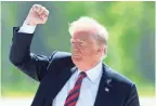  ??  ?? President Donald Trump gestures after landing Friday in Quebec, Canada.